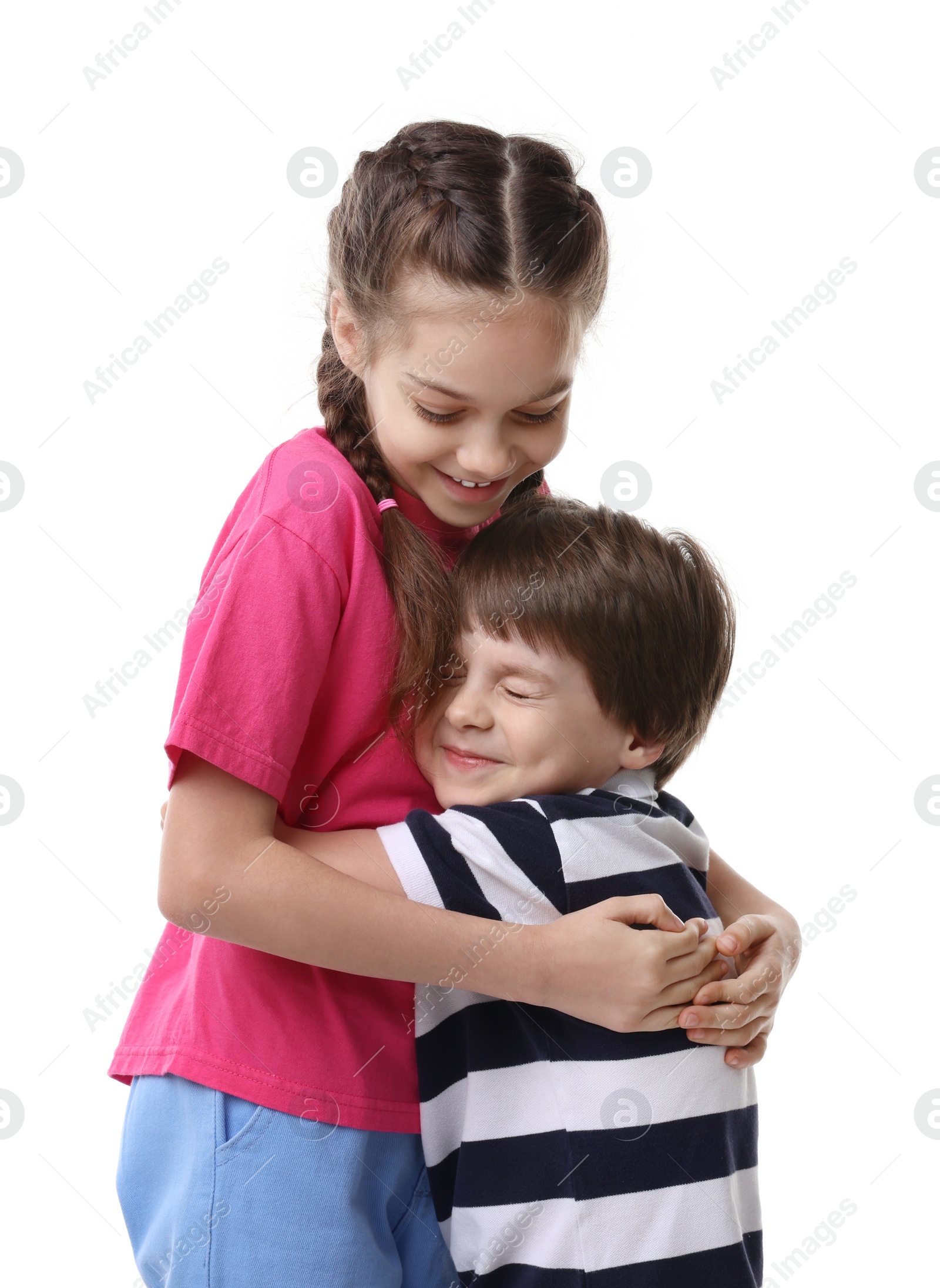 Photo of Happy brother and sister hugging on white background