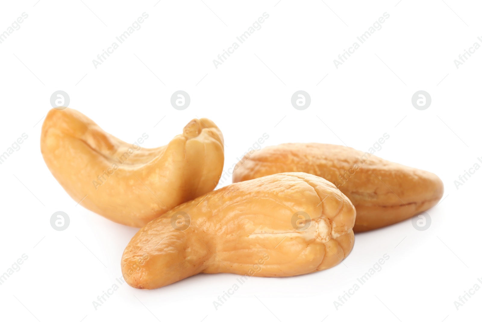 Photo of Pile of tasty organic cashew nuts isolated on white