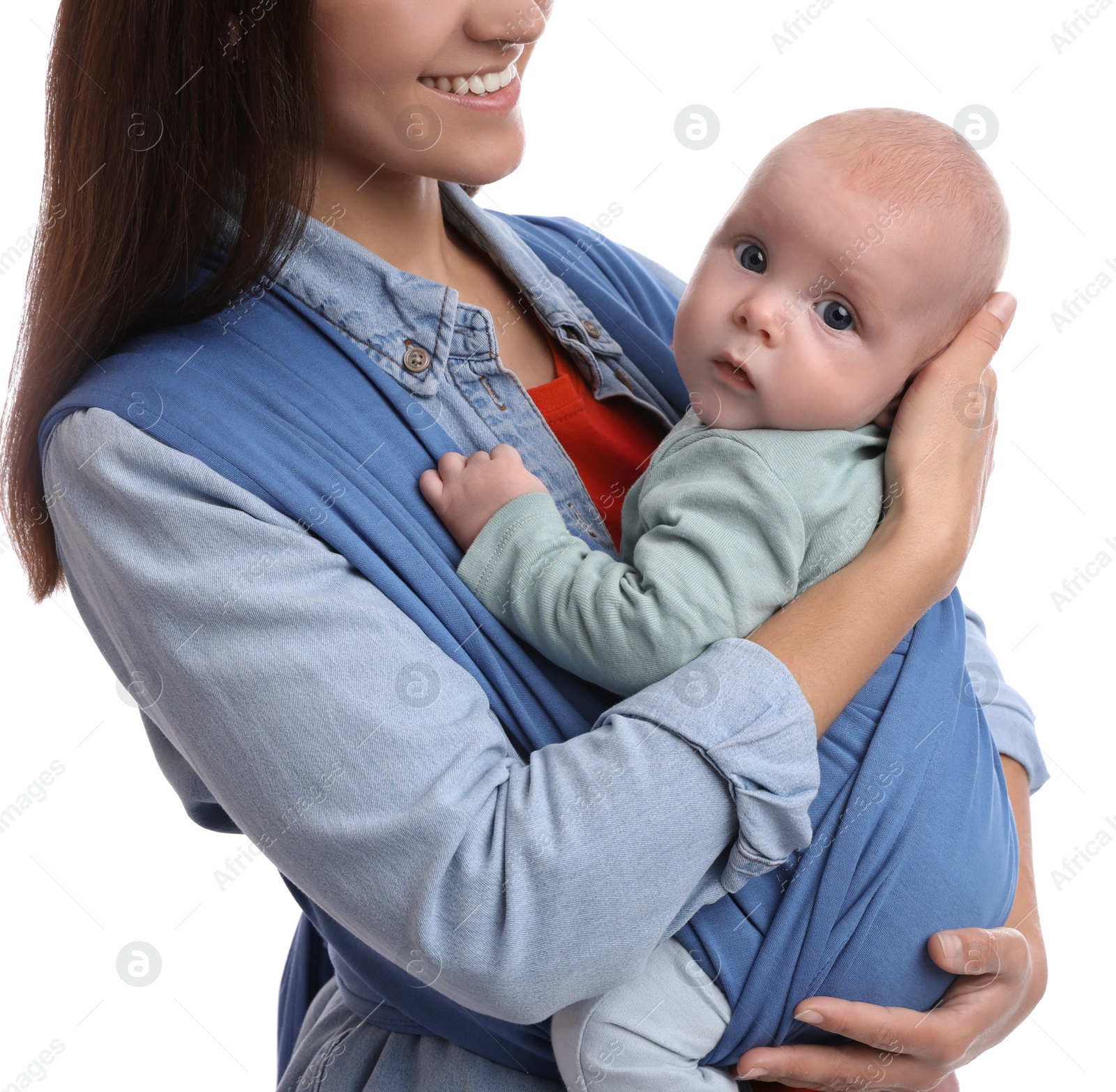 Photo of Mother holding her child in sling (baby carrier) on white background, closeup