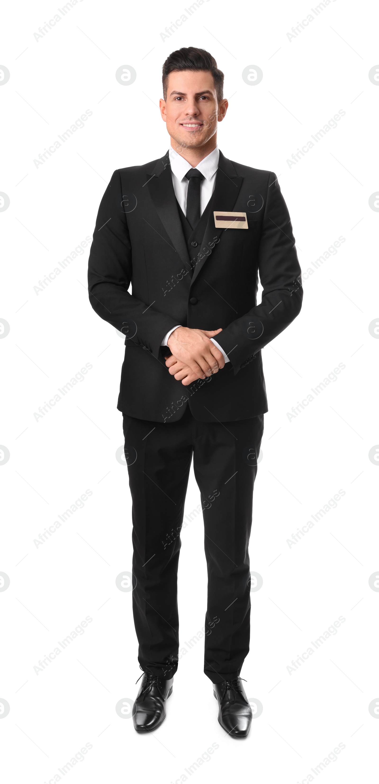 Photo of Full length portrait of happy receptionist in uniform on white background