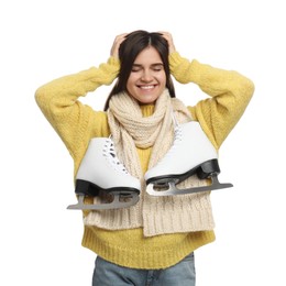 Photo of Happy woman with ice skates on white background