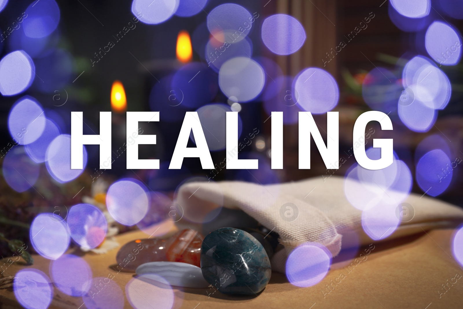 Image of Bag with gemstones and healing herbs on table. Bokeh effect 