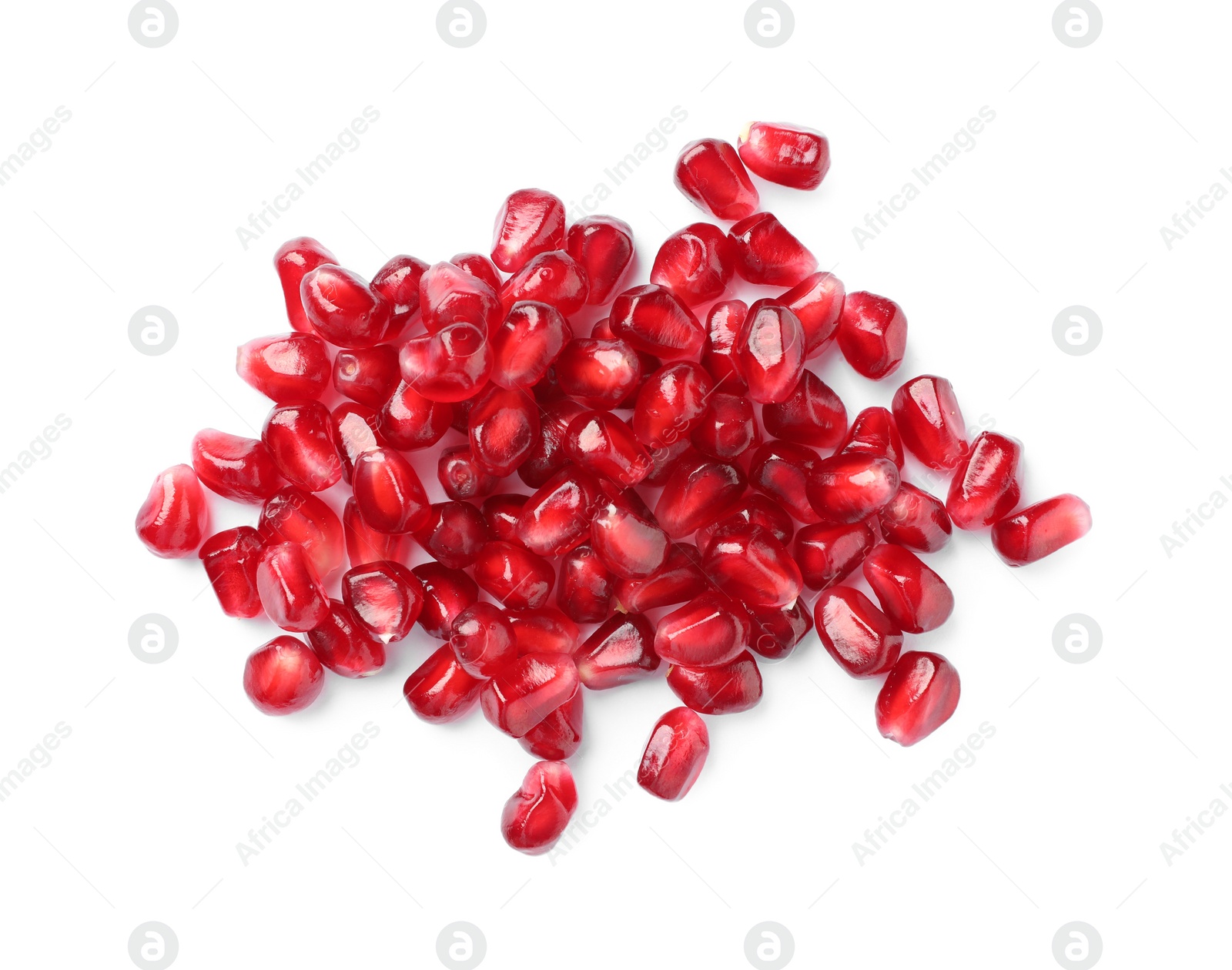 Photo of Tasty pomegranate seeds on white background, top view