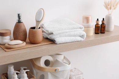 Different bath accessories and personal care products indoors