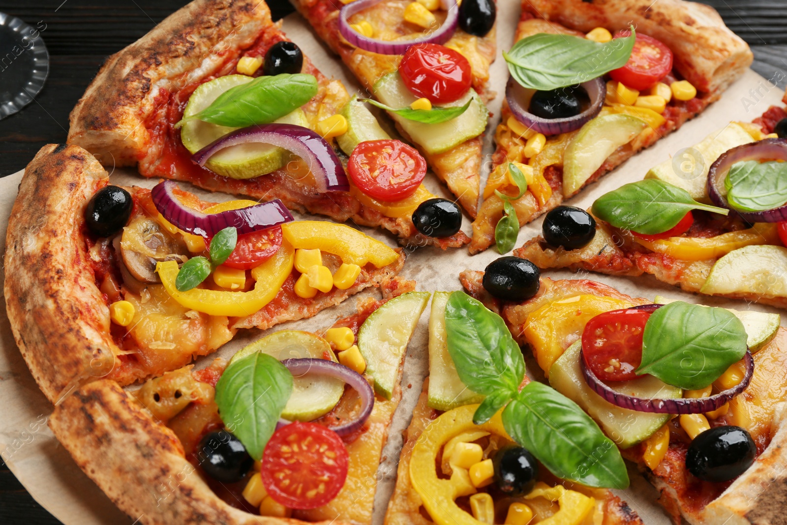 Photo of Delicious fresh vegetable pizza on table, closeup