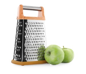 Photo of Stainless steel grater and fresh apples on white background