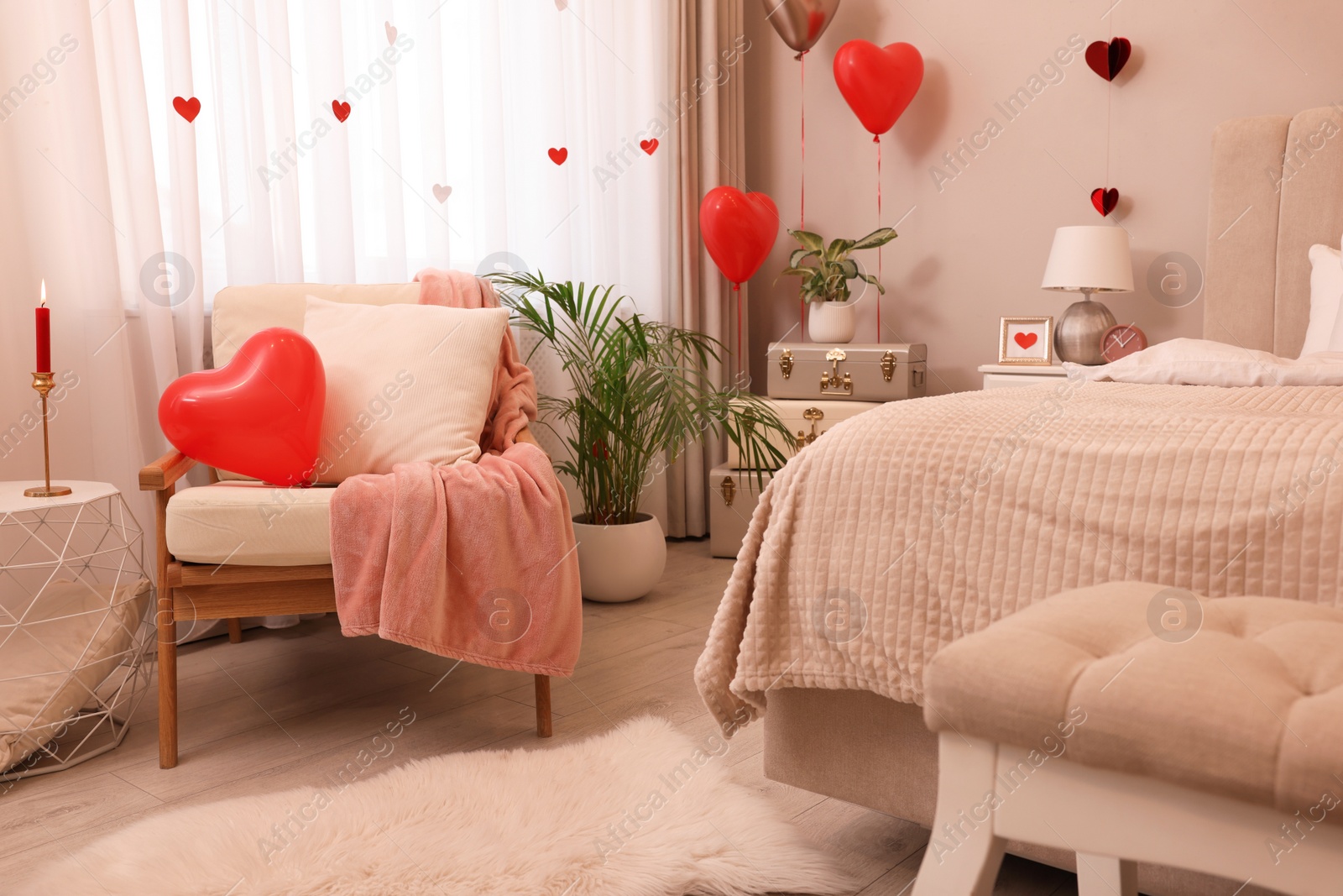 Photo of Cozy bedroom decorated for Valentine Day. Interior design