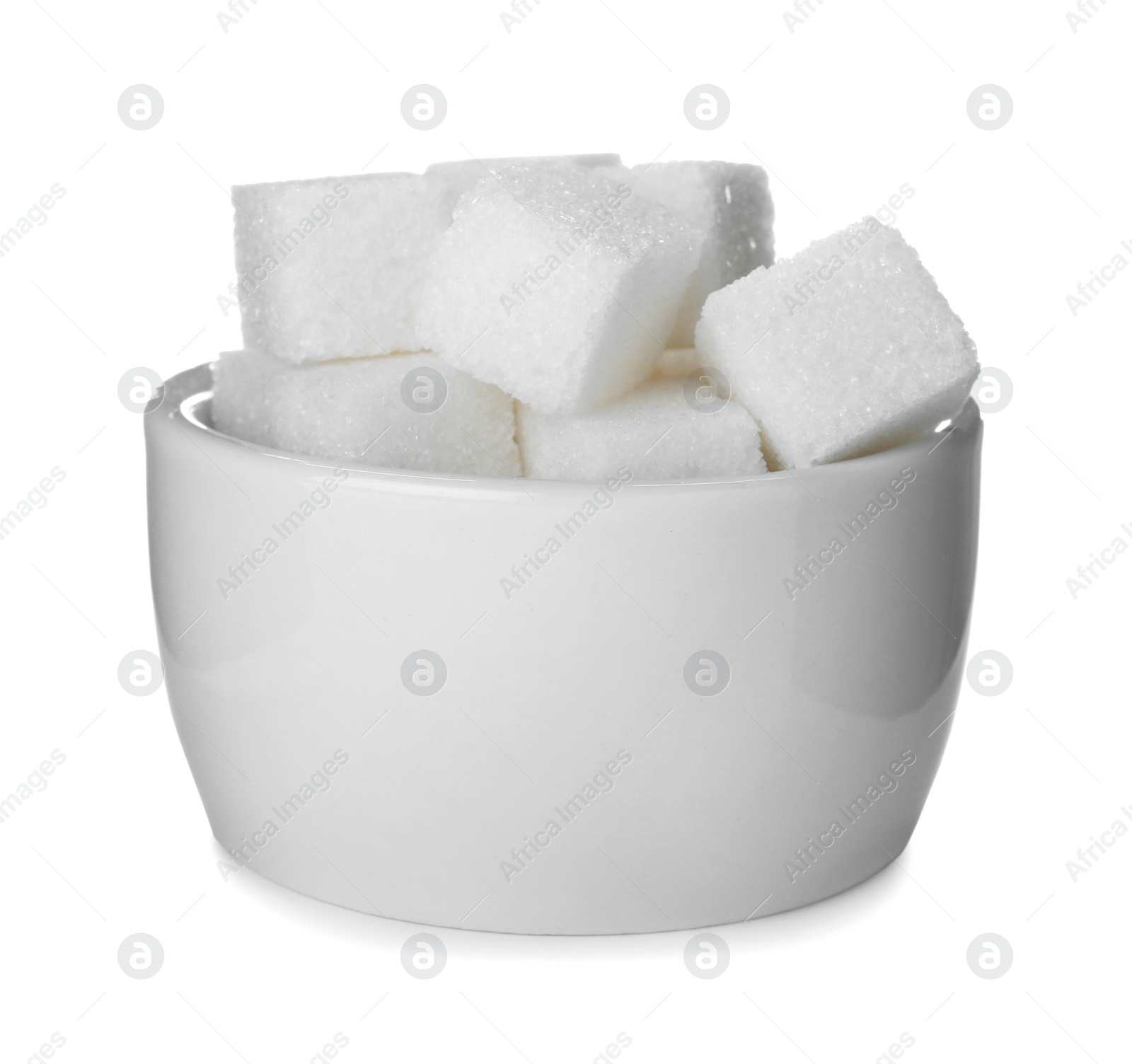 Photo of Refined sugar cubes in bowl isolated on white