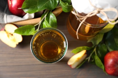 Photo of Flat lay composition with delicious apple cider on wooden table