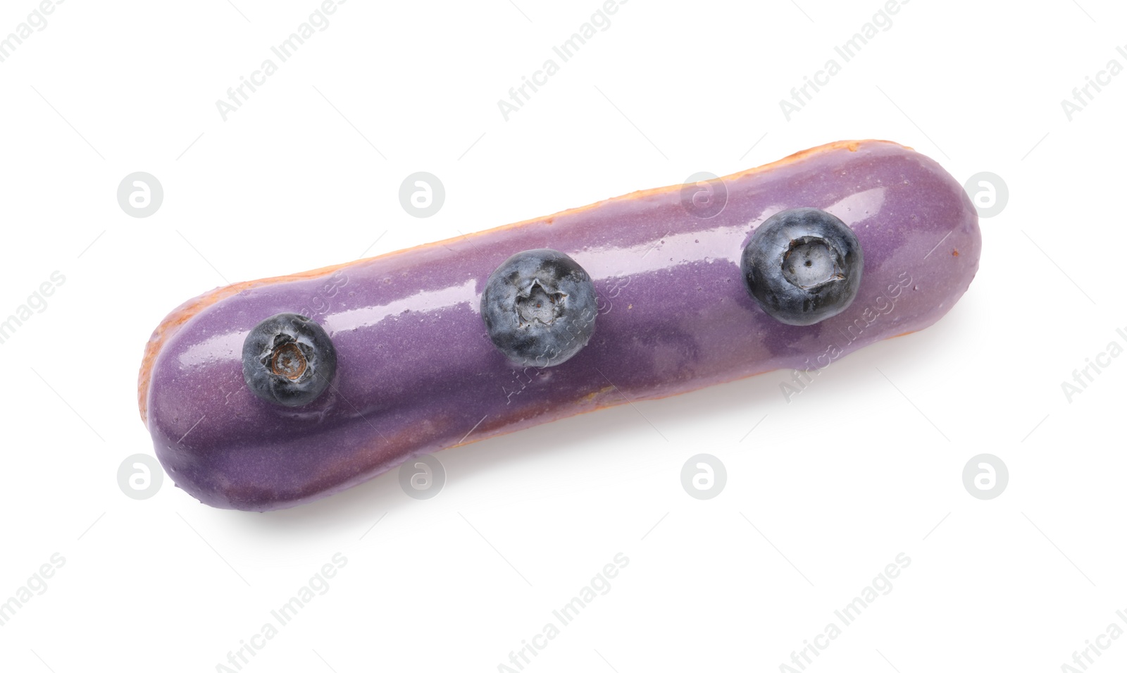 Photo of Delicious eclair decorated with blueberries isolated on white