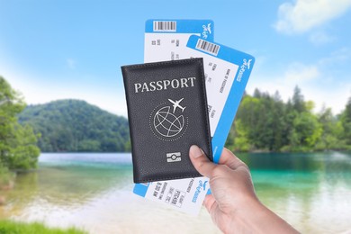 Image of Woman holding passport with boarding passes and beautiful view of river on background