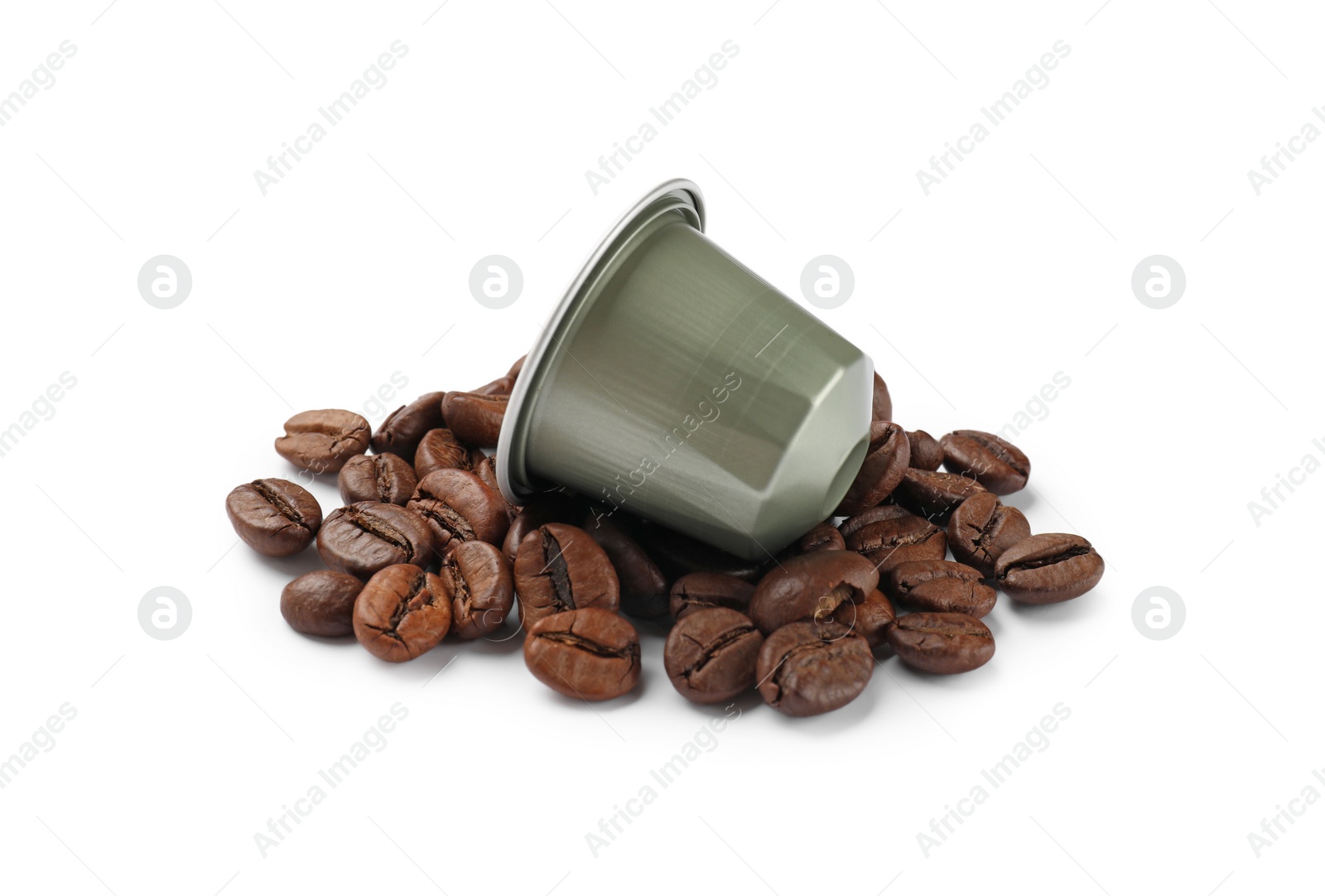 Photo of Coffee capsule and beans isolated on white