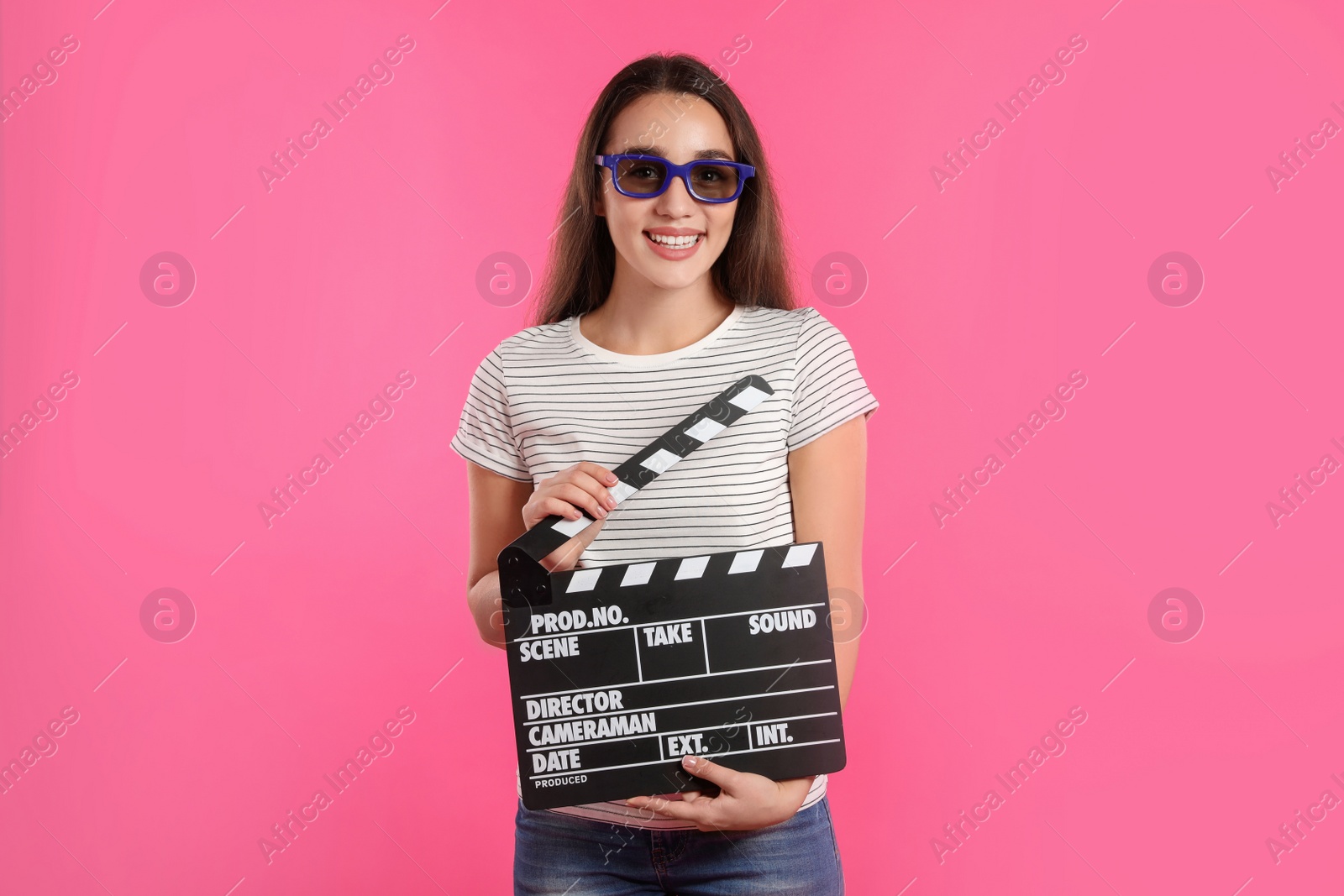 Photo of Woman with 3D glasses and clapperboard on color background. Cinema show
