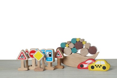 Photo of Different wooden toys isolated on white. Children's development