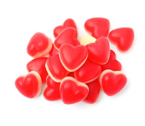 Pile of heart shaped jelly candies on white background, top view