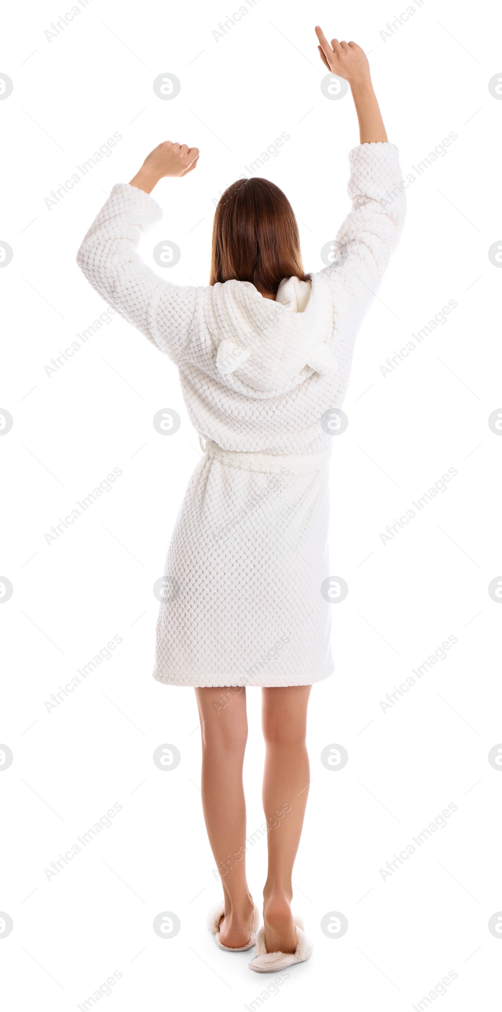 Photo of Young woman in bathrobe on white background