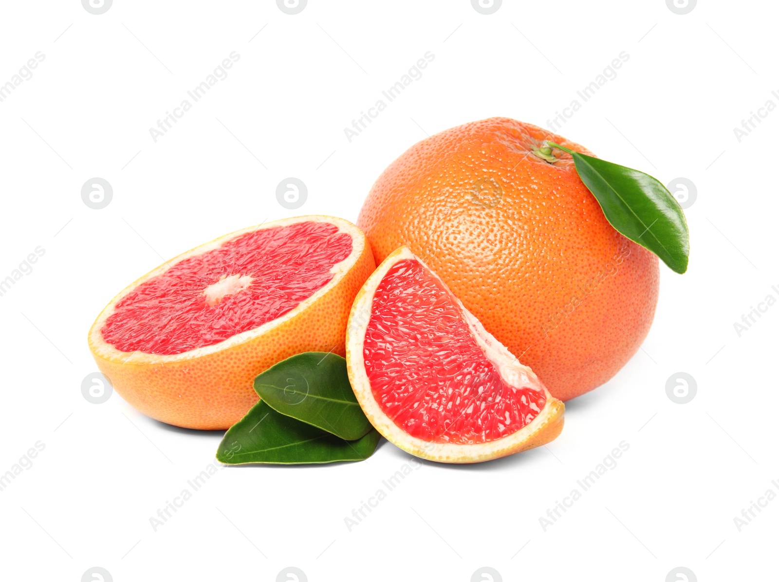 Photo of Whole and cut ripe grapefruits isolated on white