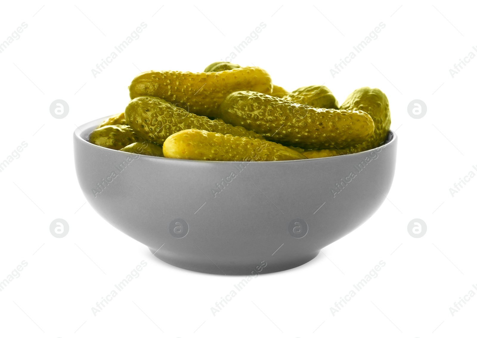 Photo of Bowl of tasty pickled cucumbers isolated on white