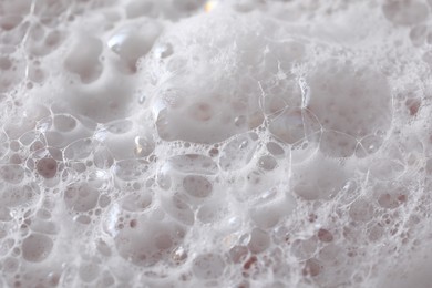 Closeup view of white fluffy washing foam