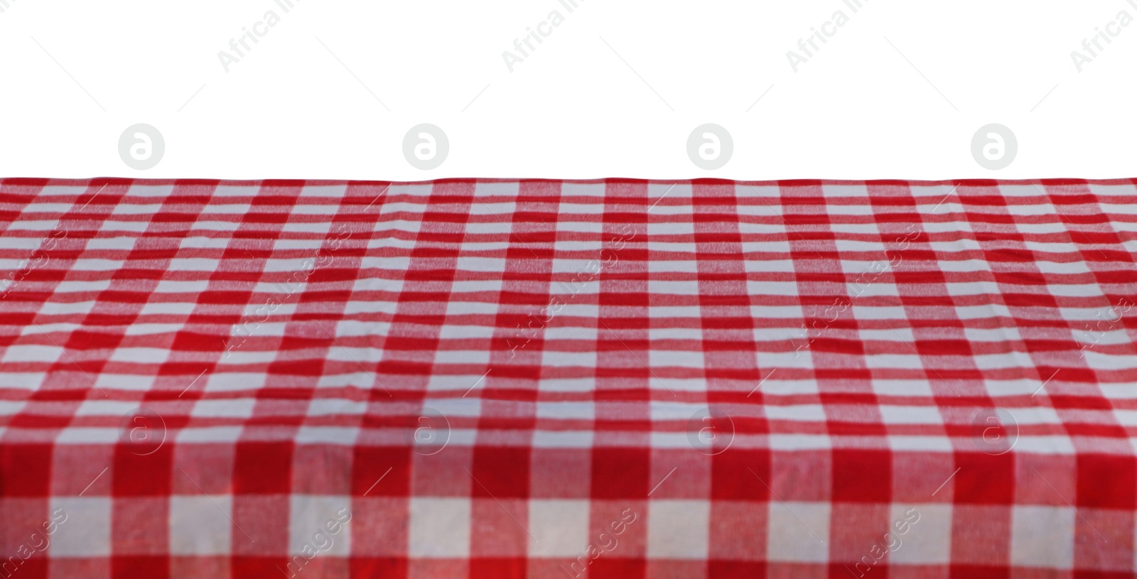 Photo of Table with checkered picnic cloth isolated on white