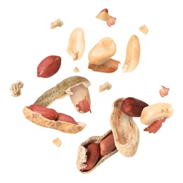 Image of Peanuts and crushed pods in air on white background