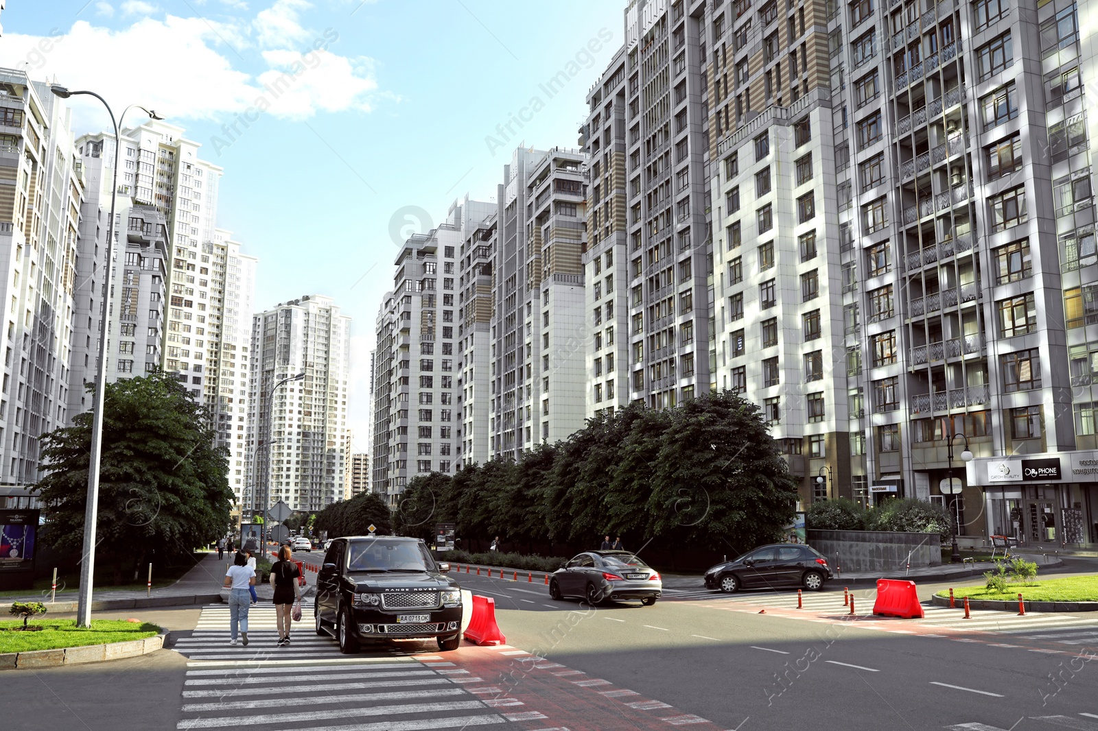 Photo of KYIV, UKRAINE - MAY 21, 2019: Beautiful view of modern housing estate in Pecherskyi district on sunny day