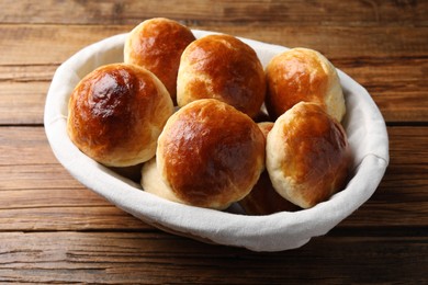 Tasty scones prepared on soda water on wooden table