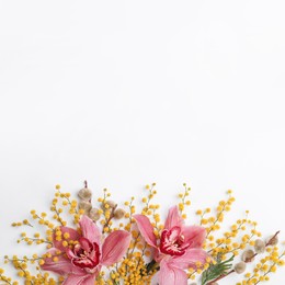 Photo of Beautiful floral composition with mimosa flowers on white background, flat lay. Space for text