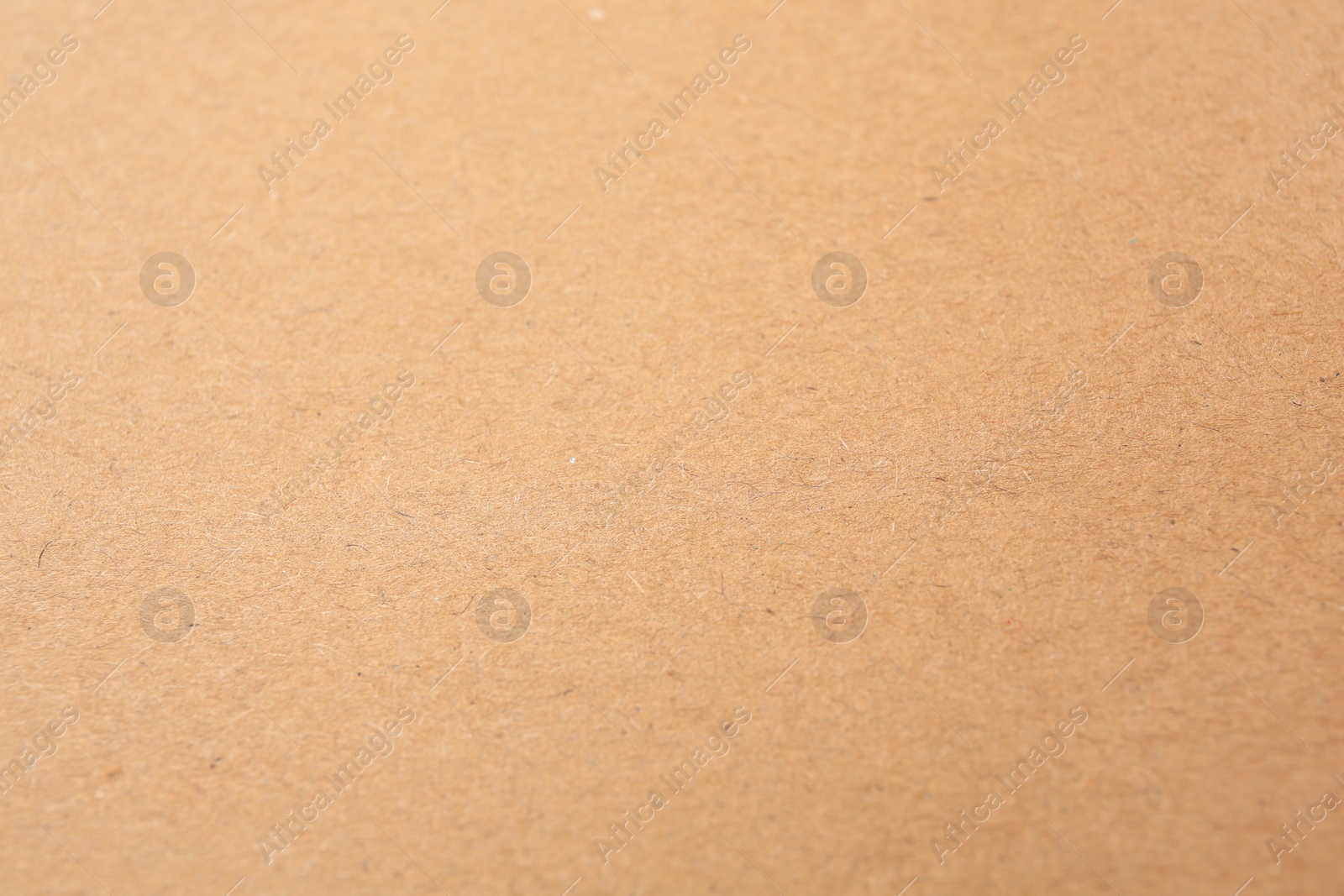 Photo of Texture of beige paper sheet as background, closeup