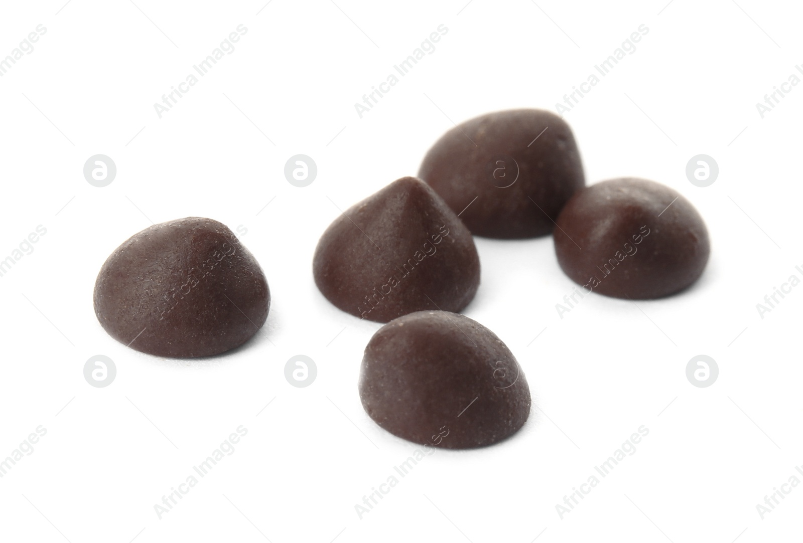 Photo of Delicious dark chocolate chips on white background