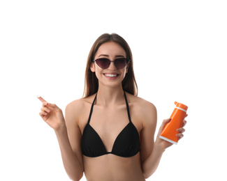 Photo of Young woman with sun protection cream on white background