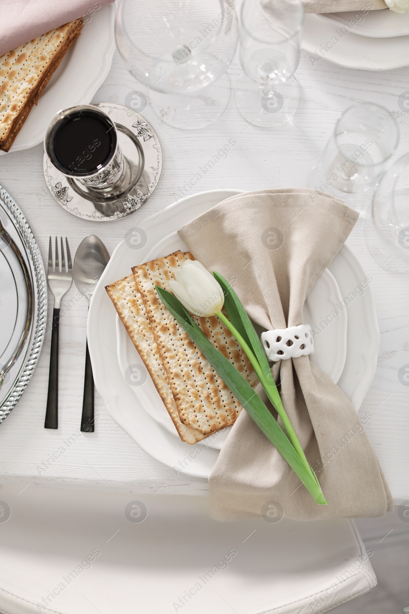 Photo of Festive Passover table setting, top view. Pesach celebration