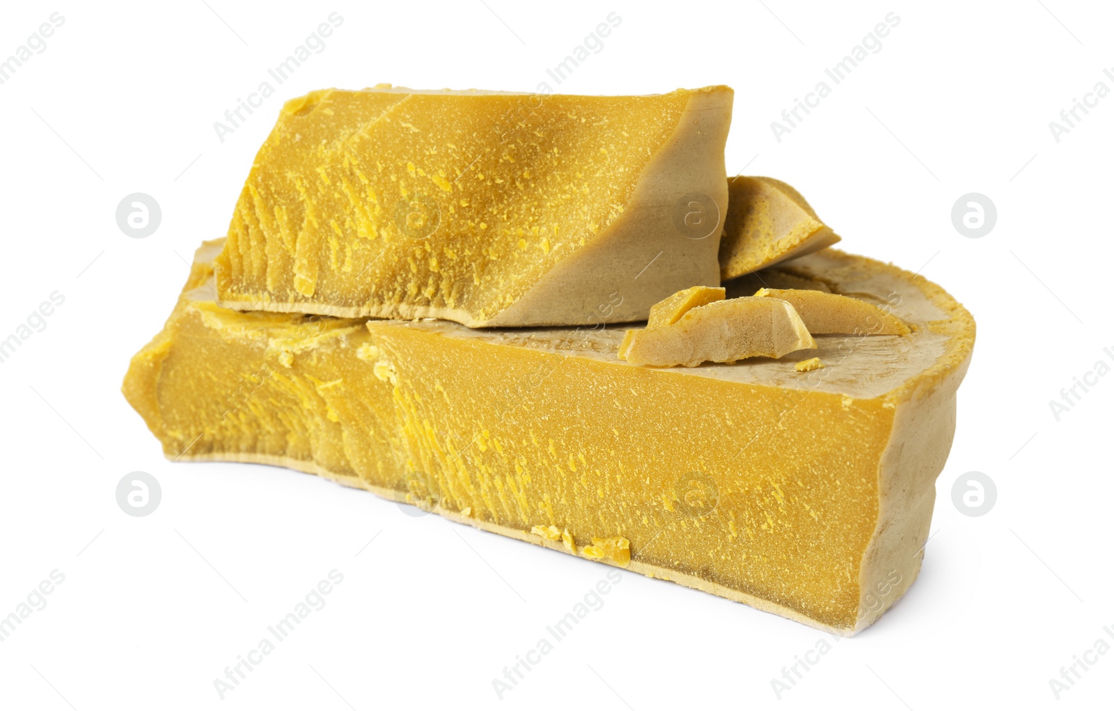 Photo of Natural organic beeswax blocks isolated on white