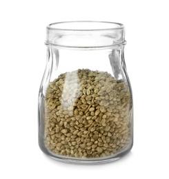 Photo of Glass jar of hemp seeds on white background