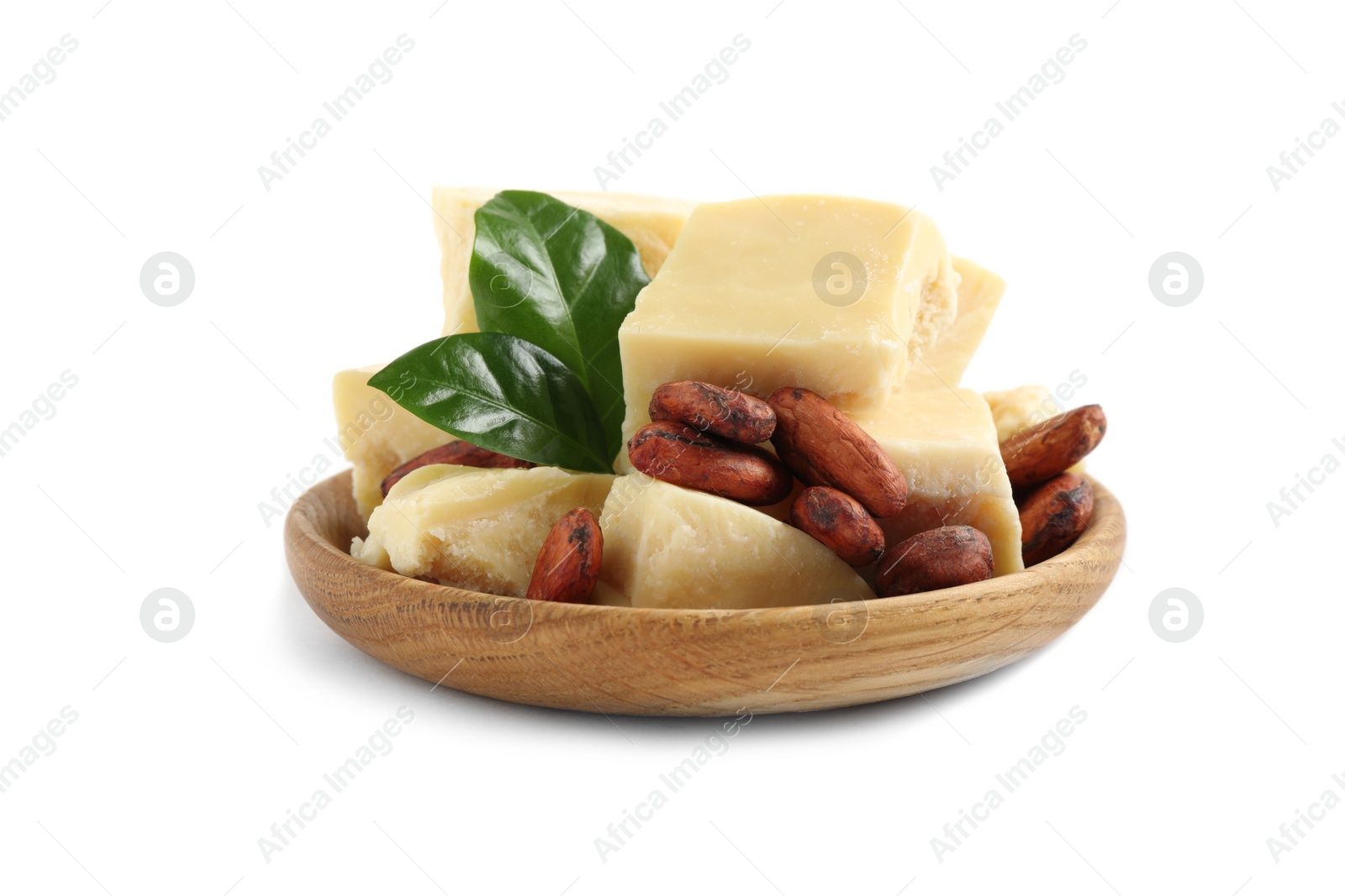 Photo of Organic cocoa butter, beans and green leaves in wooden bowl isolated on white