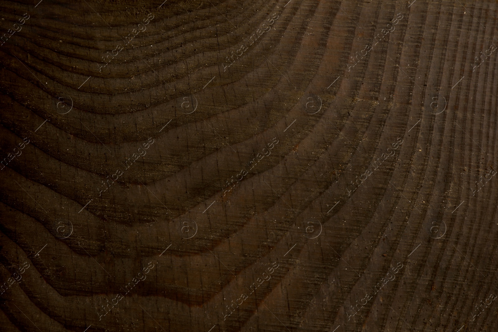 Photo of Texture of dark wooden surface as background, closeup view