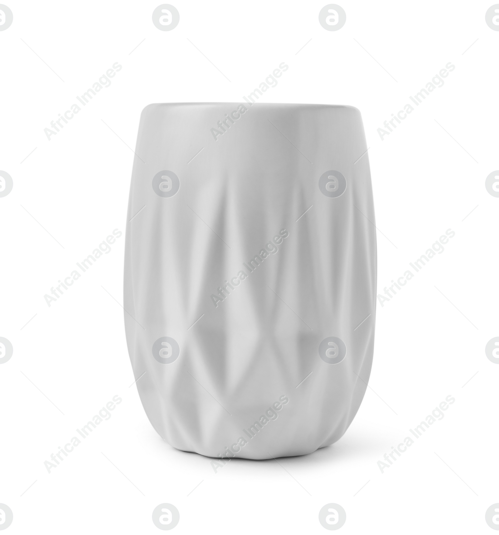 Photo of Bath accessory. Ceramic toothbrush holder isolated on white