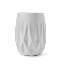 Photo of Bath accessory. Ceramic toothbrush holder isolated on white