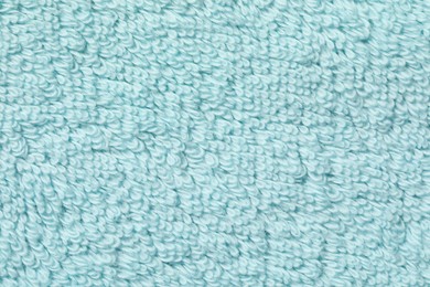 Texture of soft light blue fabric as background, top view