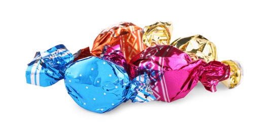 Photo of Candies in colorful wrappers isolated on white