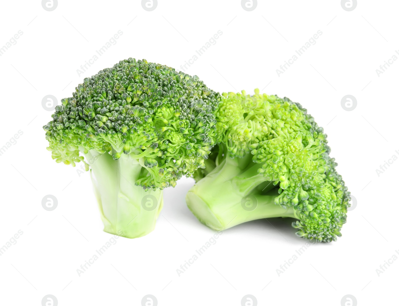 Photo of Fresh green broccoli on white background. Organic food