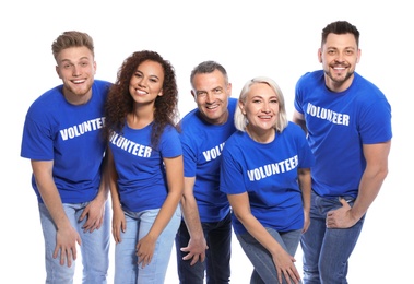 Team of volunteers in uniform on white background