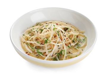 Photo of Plate of noodles with broth and herb isolated on white