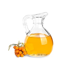 Photo of Natural sea buckthorn oil and fresh berries on white background