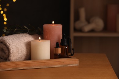 Beautiful composition with different spa products on table indoors, space for text