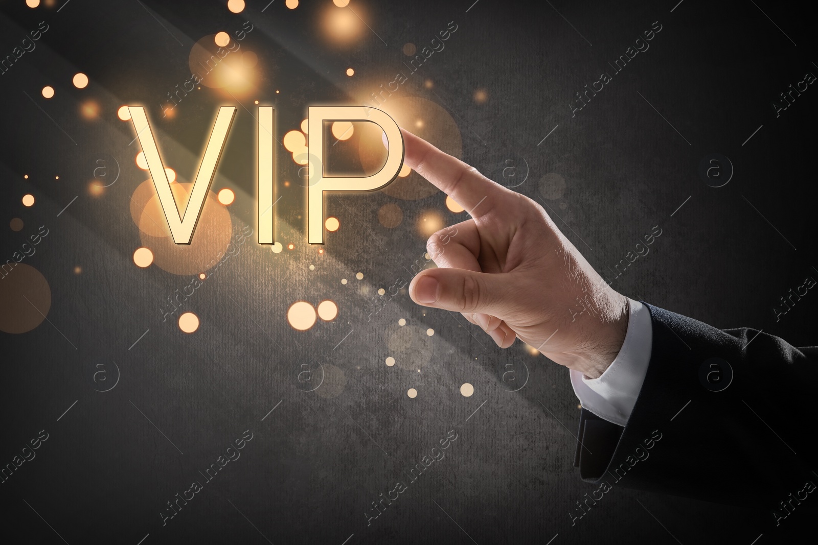 Image of VIP member. Closeup view of man pointing at virtual abbreviation on dark background