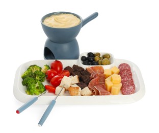 Fondue with tasty melted cheese, forks and different snacks isolated on white