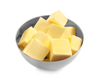 Photo of Bowl with cubes of fresh butter on white background