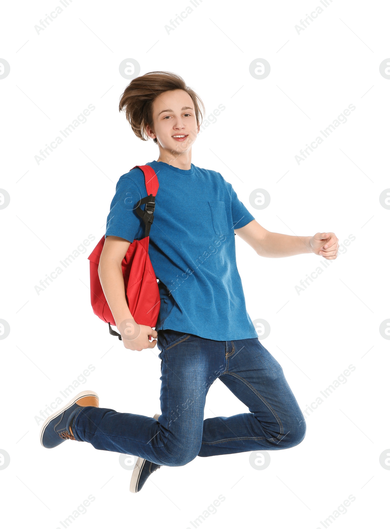 Photo of Happy teenager boy in casual clothes on white background