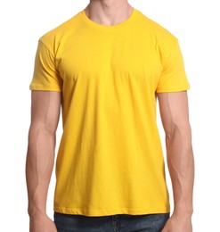 Man wearing yellow t-shirt on white background, closeup. Mockup for design